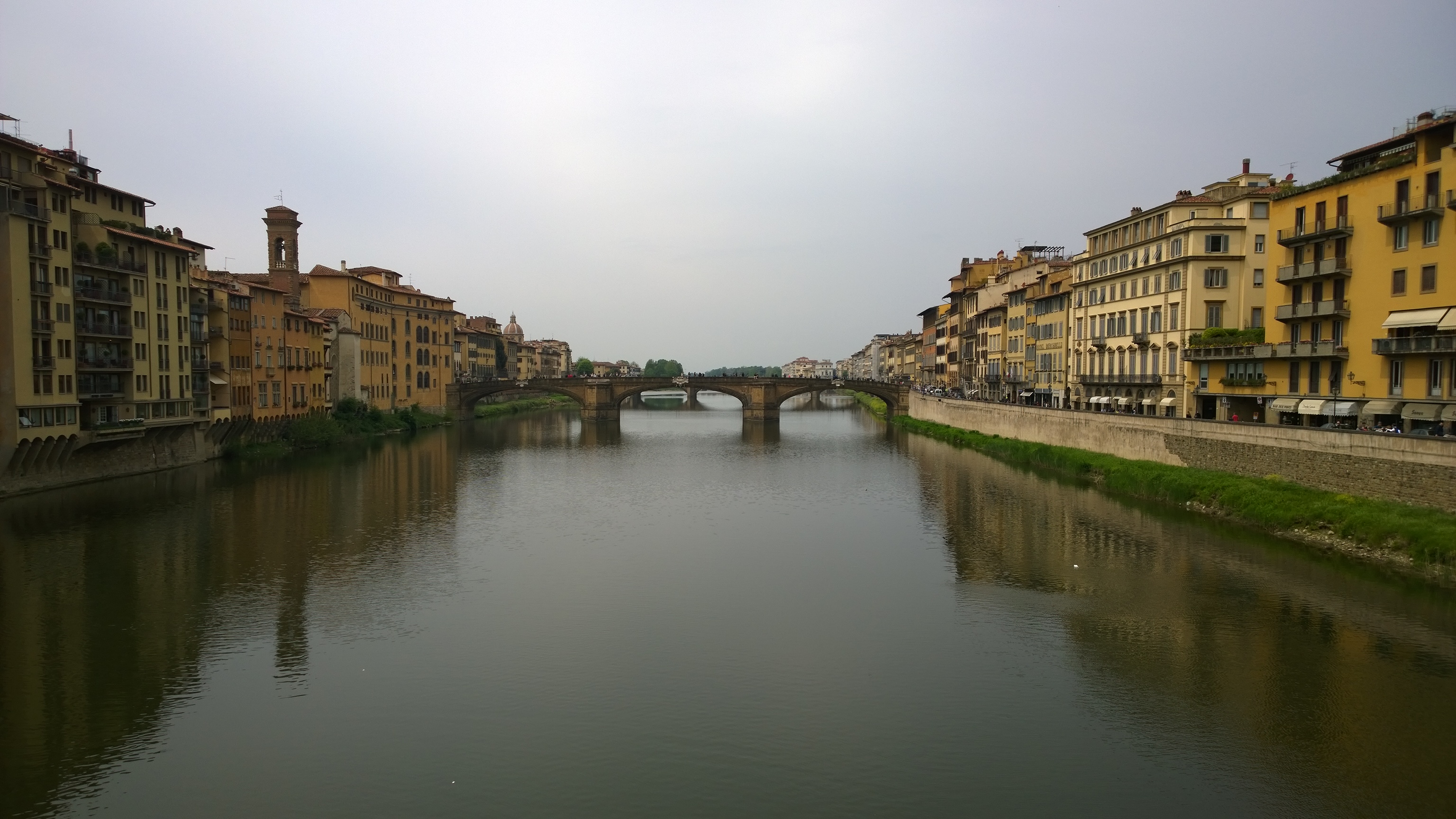 Bridge Over Calm River In Historic City, cityscapes fine art print by UNFRAMED Archive, 24 x 16 in