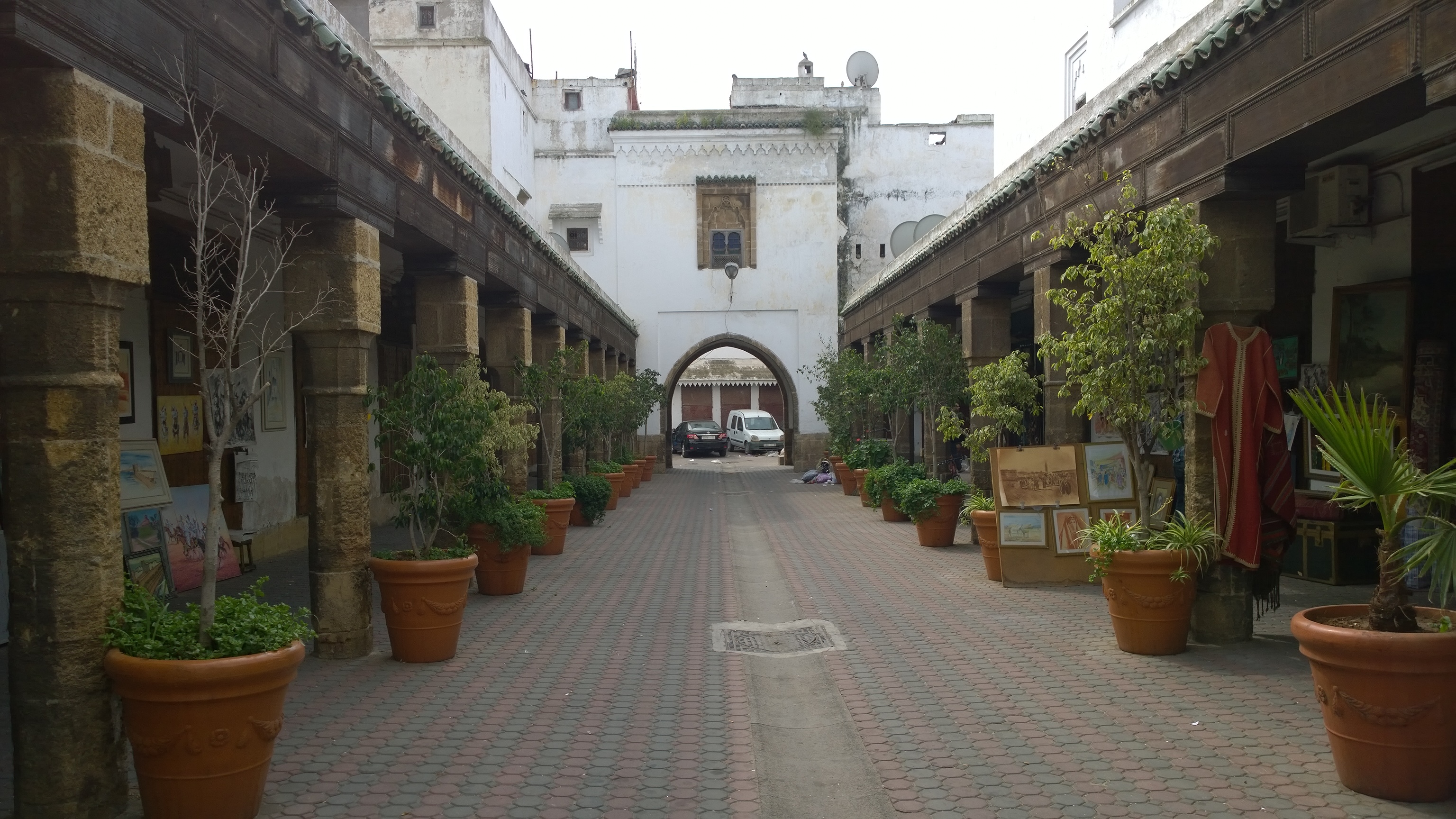 Charming Market Courtyard With Archway, cityscapes fine art print by UNFRAMED Archive, 24 x 16 in