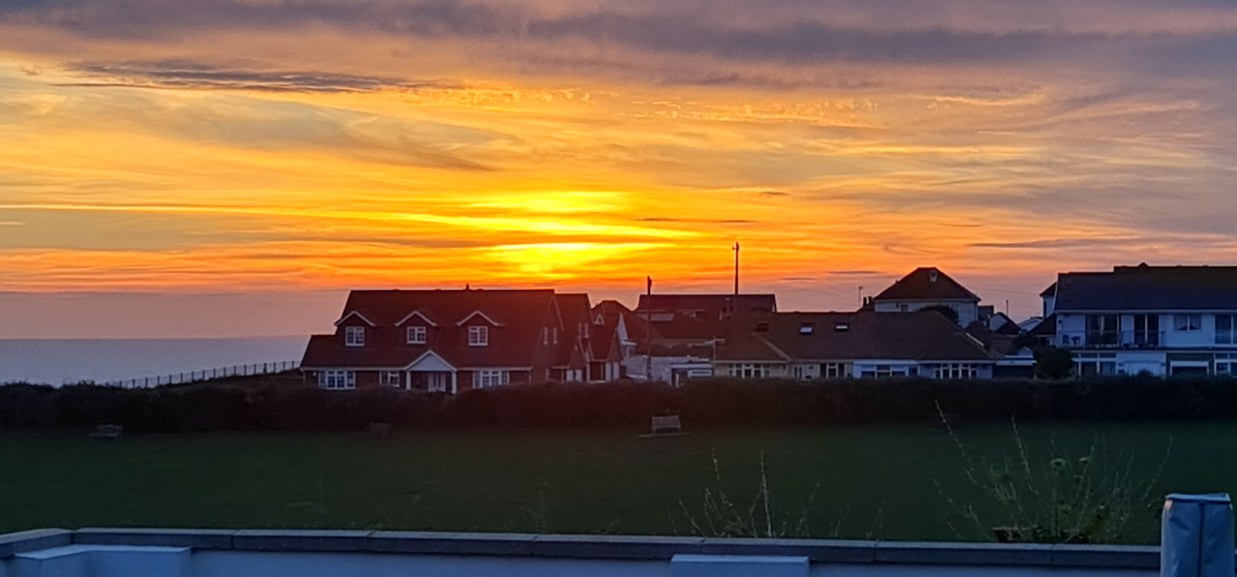 Coastal Sunset Over Houses, cityscapes fine art print by UNFRAMED Archive, 24 x 16 in