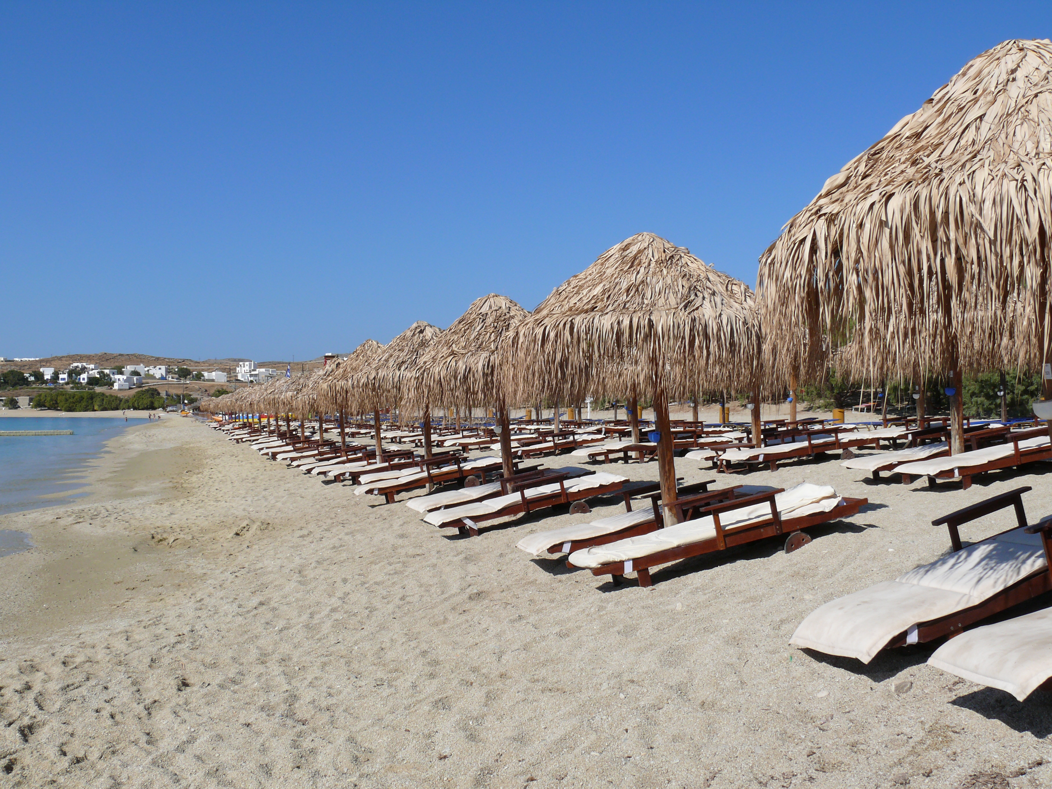 Beach Loungers And Umbrellas, landscapes fine art print by UNFRAMED Archive, 24 x 16 in