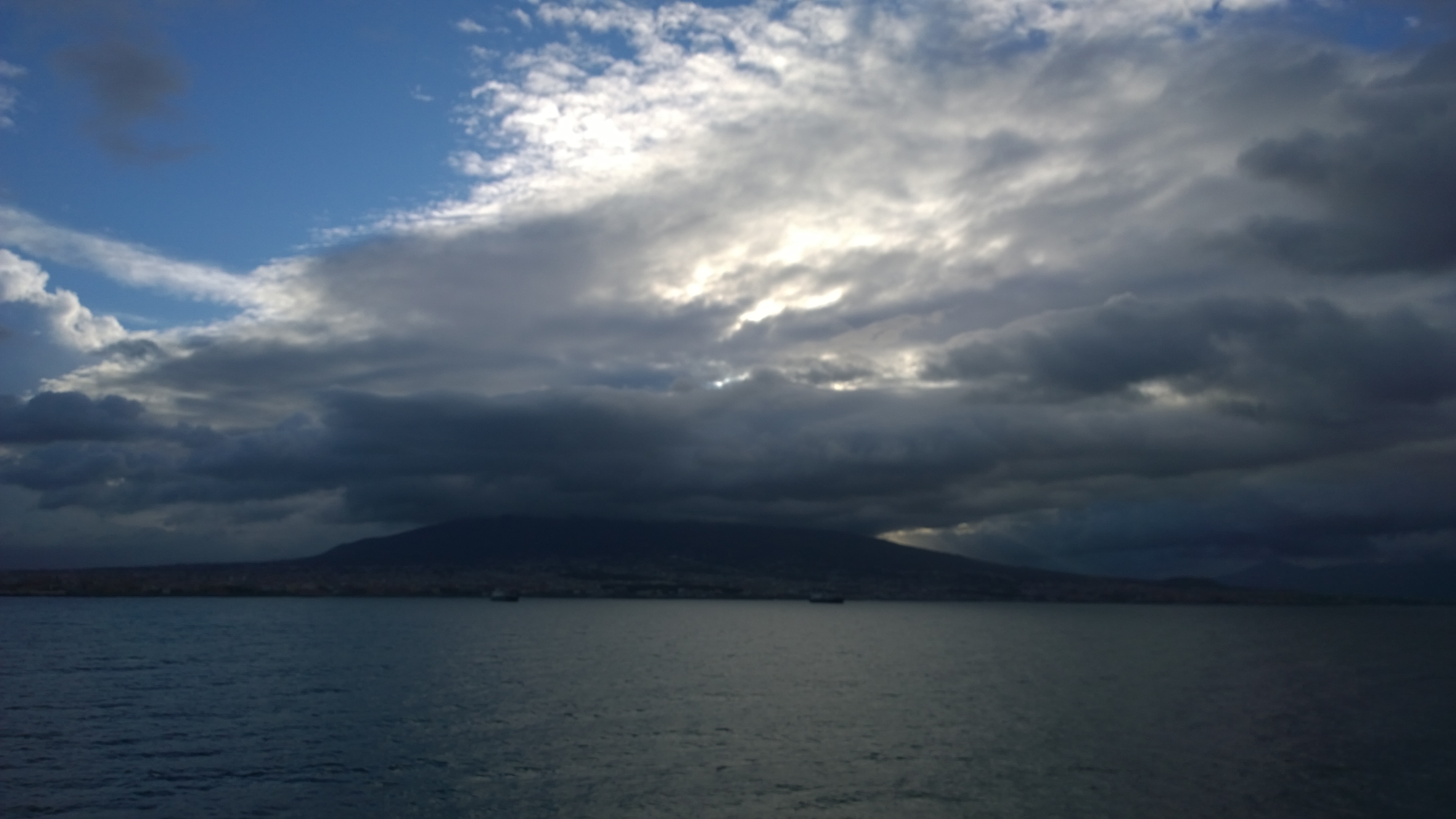 Cloudy Sky Over A Calm Coastline, nature fine art print by UNFRAMED Archive, 24 x 16 in
